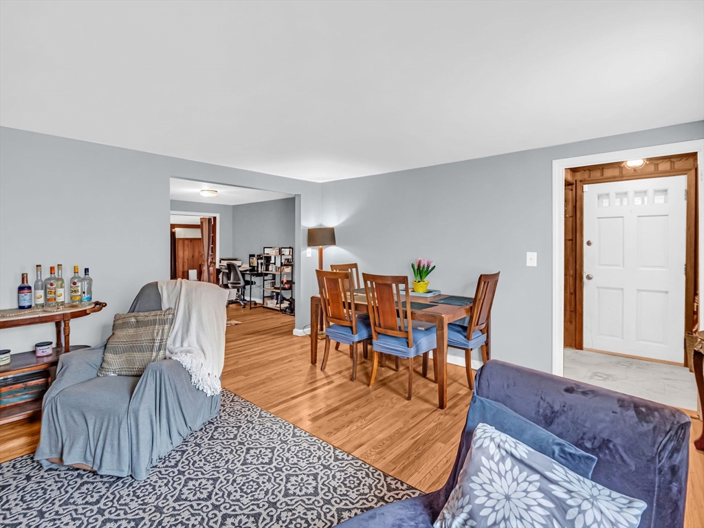 173 Bennett Road Hampden, MA 01036 - Photo 4 of 35 a dining room with furniture and wooden floor