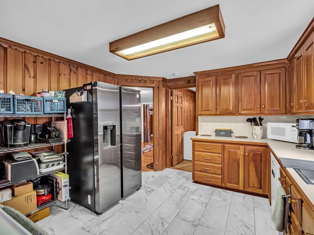 173 Bennett Road Hampden, MA 01036 - Photo 8 of 35 a kitchen with stainless steel appliances granite countertop a refrigerator and a stove top oven