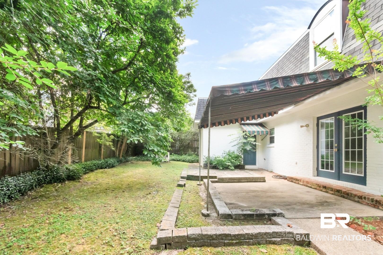 3263 Stein Street Mobile, AL 36608 - Photo 40 of 46 View of yard featuring a patio and french doors