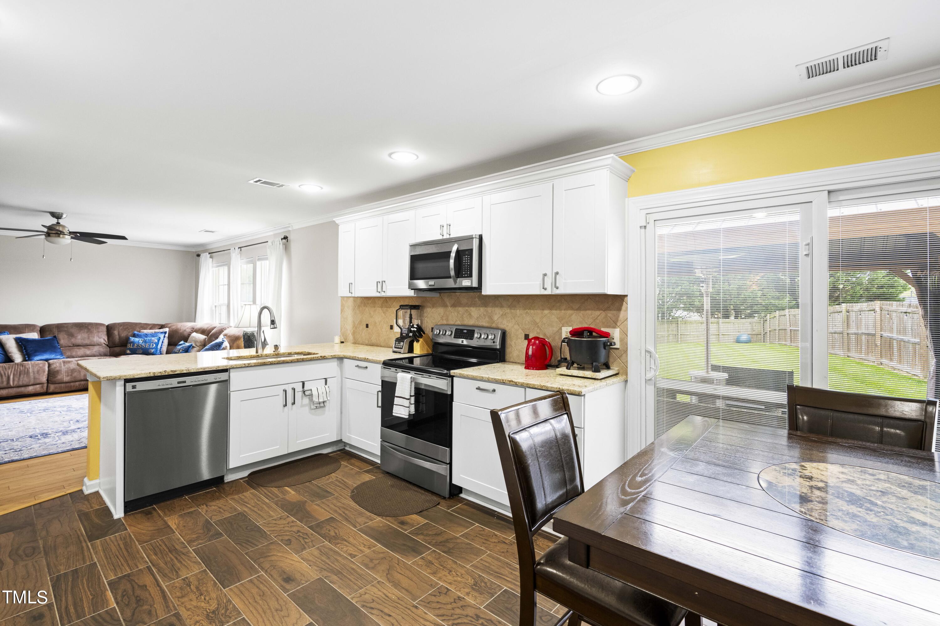 3216 Flowery Branch Road Raleigh, NC 27610 - Photo 9 of 28 KITCHEN