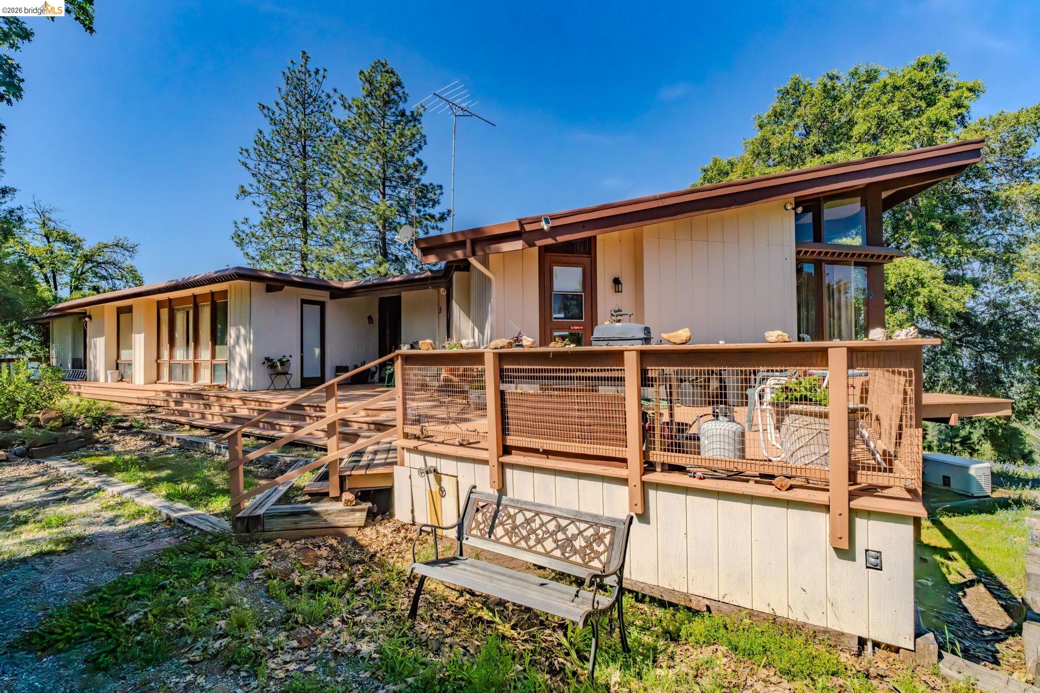 6161 Fullen Road Murphys, CA 95247 - Photo 49 of 53 front view of a house with a street