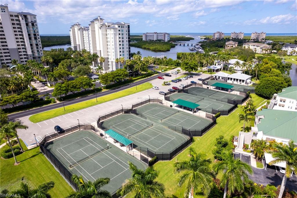 754 Wiggins Bay Drive Naples, FL 34110 - Photo 34 of 34 a view of a city with tall buildings