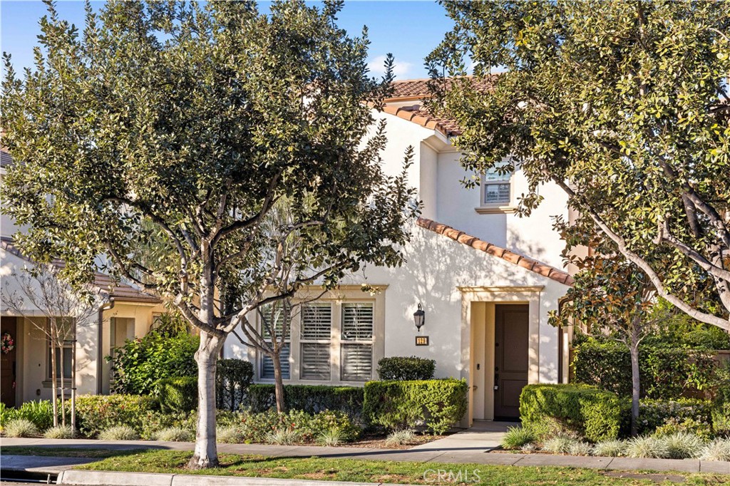 129 Pathway Irvine, CA 92618 - Photo 1 of 1 a front view of a house with garden