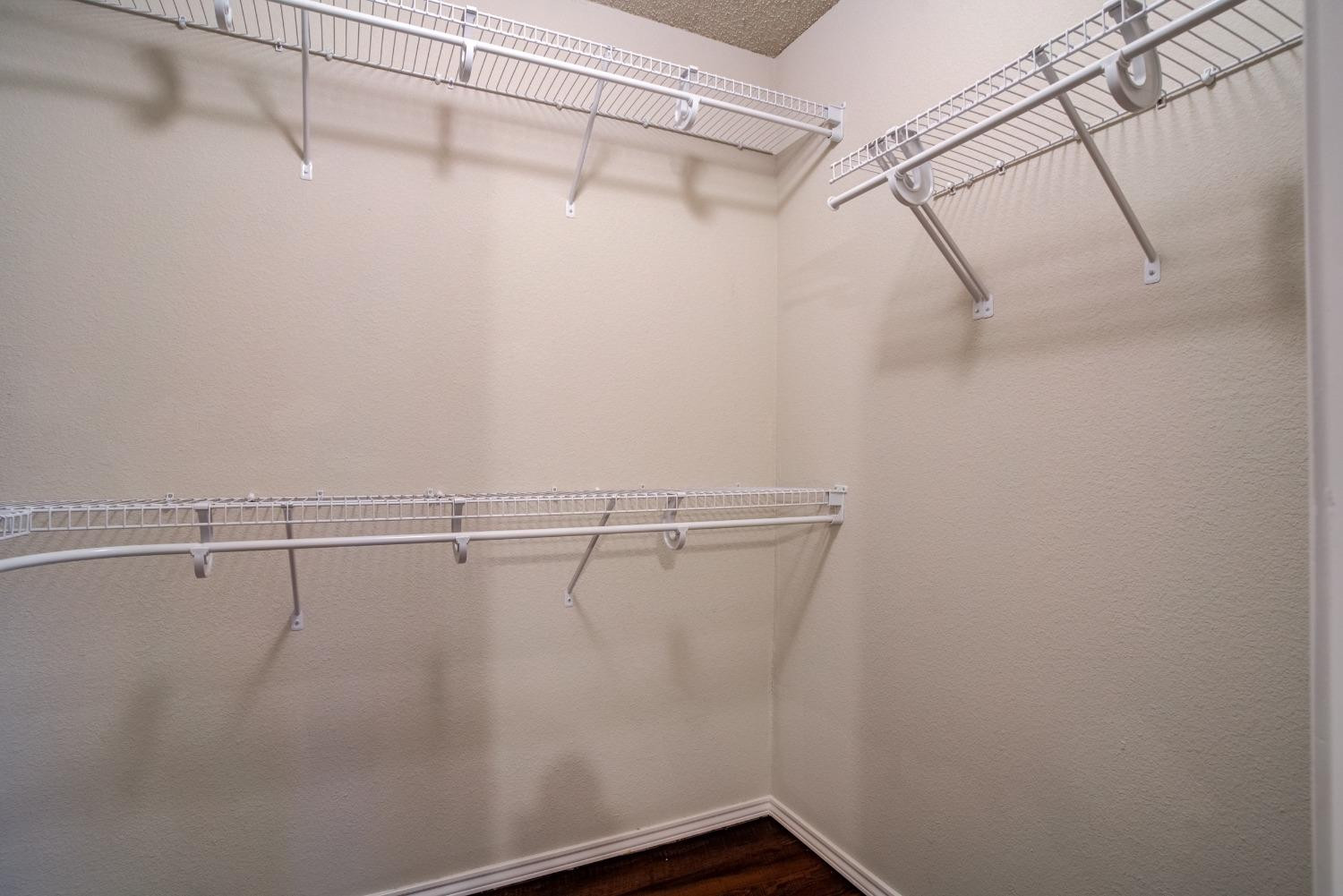 2101 Main Street, Unit 2 Lubbock, TX 79401 - Photo 25 of 31 a view of a room with racks on the wall