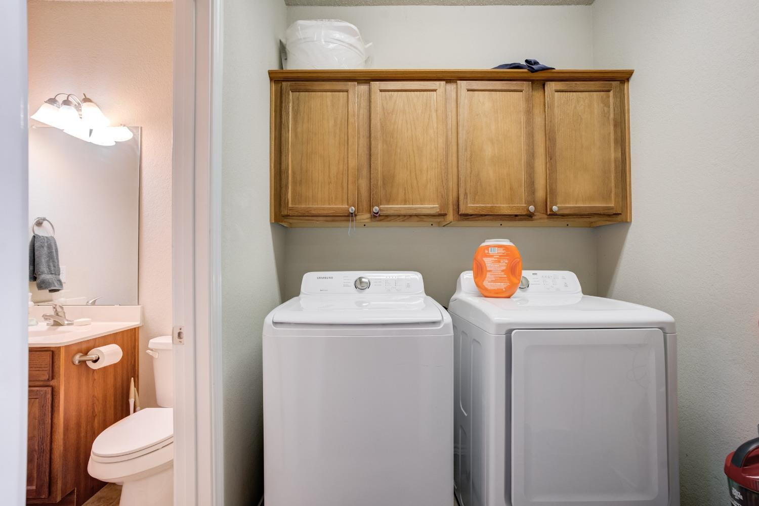 2101 Main Street, Unit 2 Lubbock, TX 79401 - Photo 30 of 31 a utility room with dryer and washer