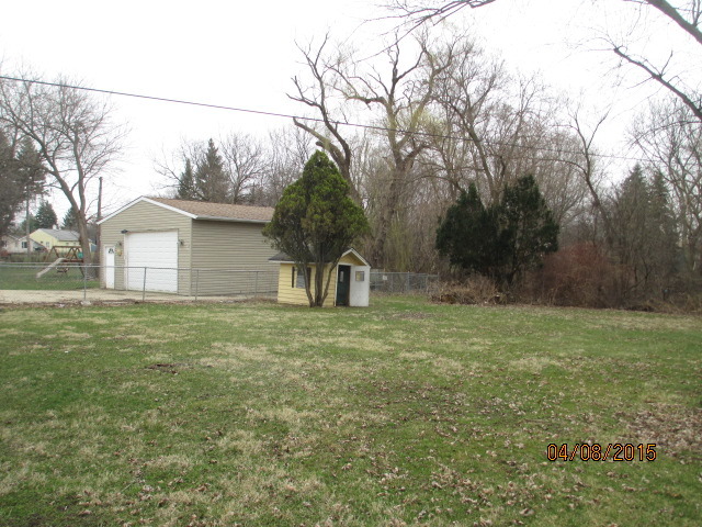 119 East Oltendorf Road Streamwood, IL 60107 - Photo 2 of 11 a backyard of a house with lots of green space
