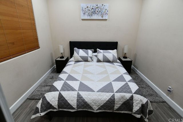 a kitchen with a sink stove and refrigerator