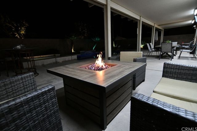 a view of swimming pool outdoor seating