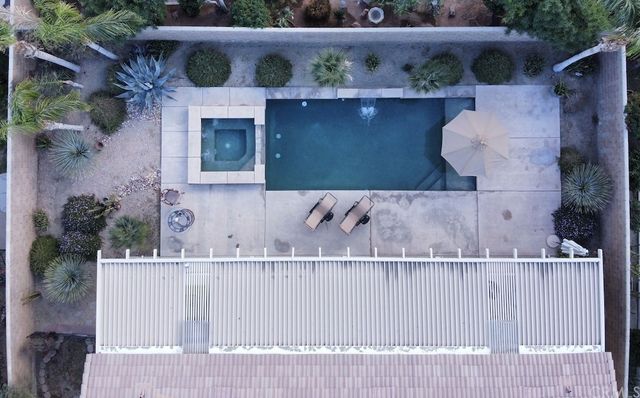 a kitchen with stainless steel appliances granite countertop sink stove top oven and cabinets