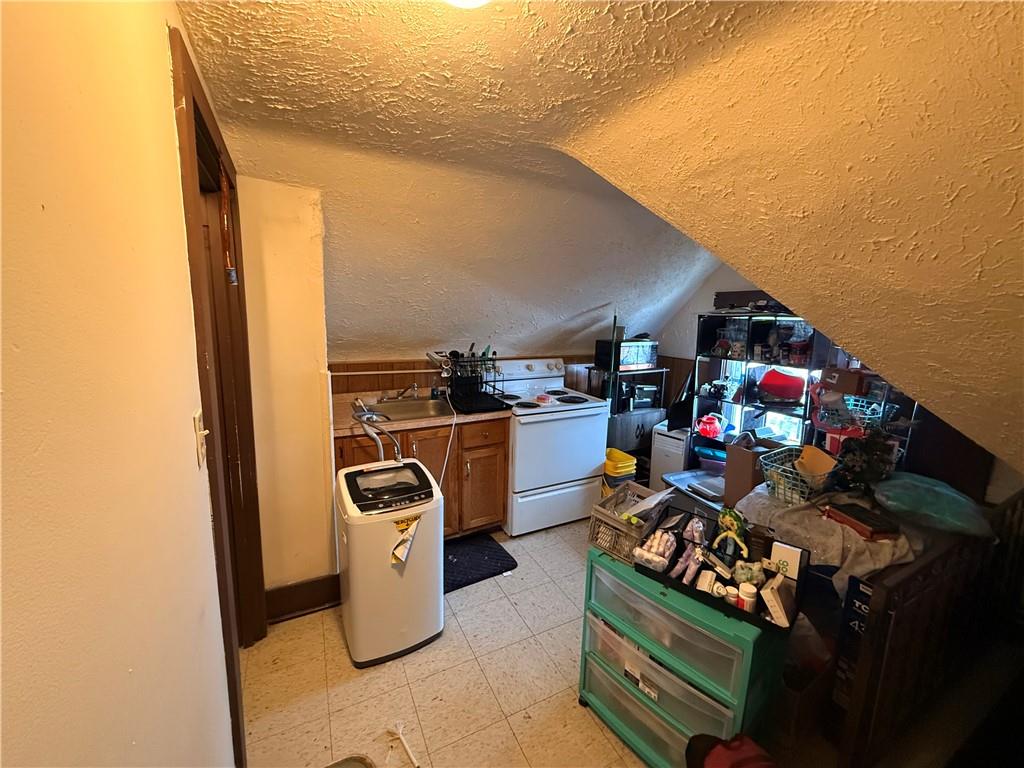 325 West Cunningham Street Butler, PA 16001 - Photo 13 of 18 a storage room with washer and dryer