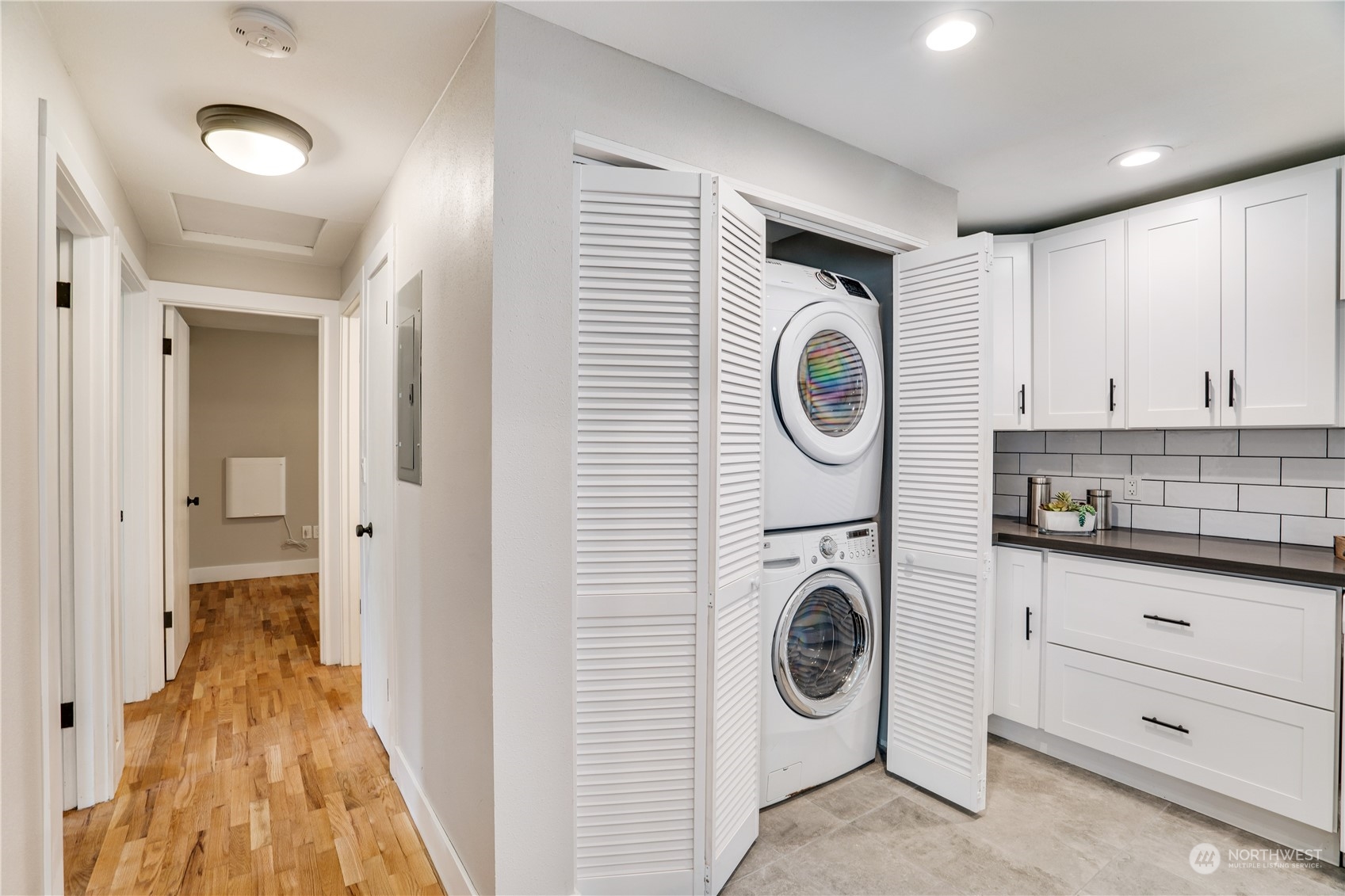 1209 South Donovan Street Seattle, WA 98108 - Photo 11 of 19 a view of a hallway with washer and dryer