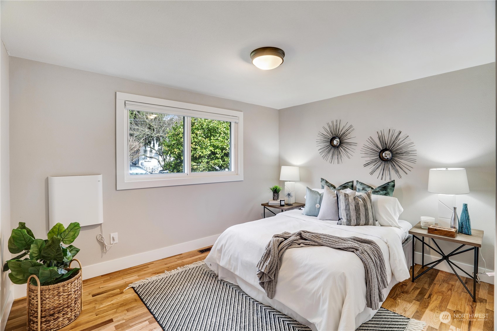 1209 South Donovan Street Seattle, WA 98108 - Photo 12 of 19 a bedroom with a bed and a window