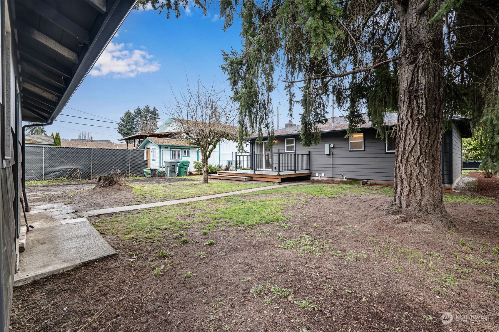 1209 South Donovan Street Seattle, WA 98108 - Photo 17 of 19 a front view of a house with a yard