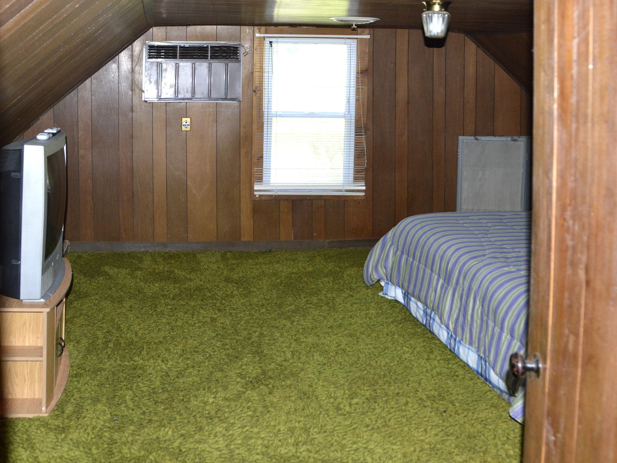 244 Sallings Road Luttrell, TN 37779 - Photo 12 of 19 a bedroom with a bed and a window