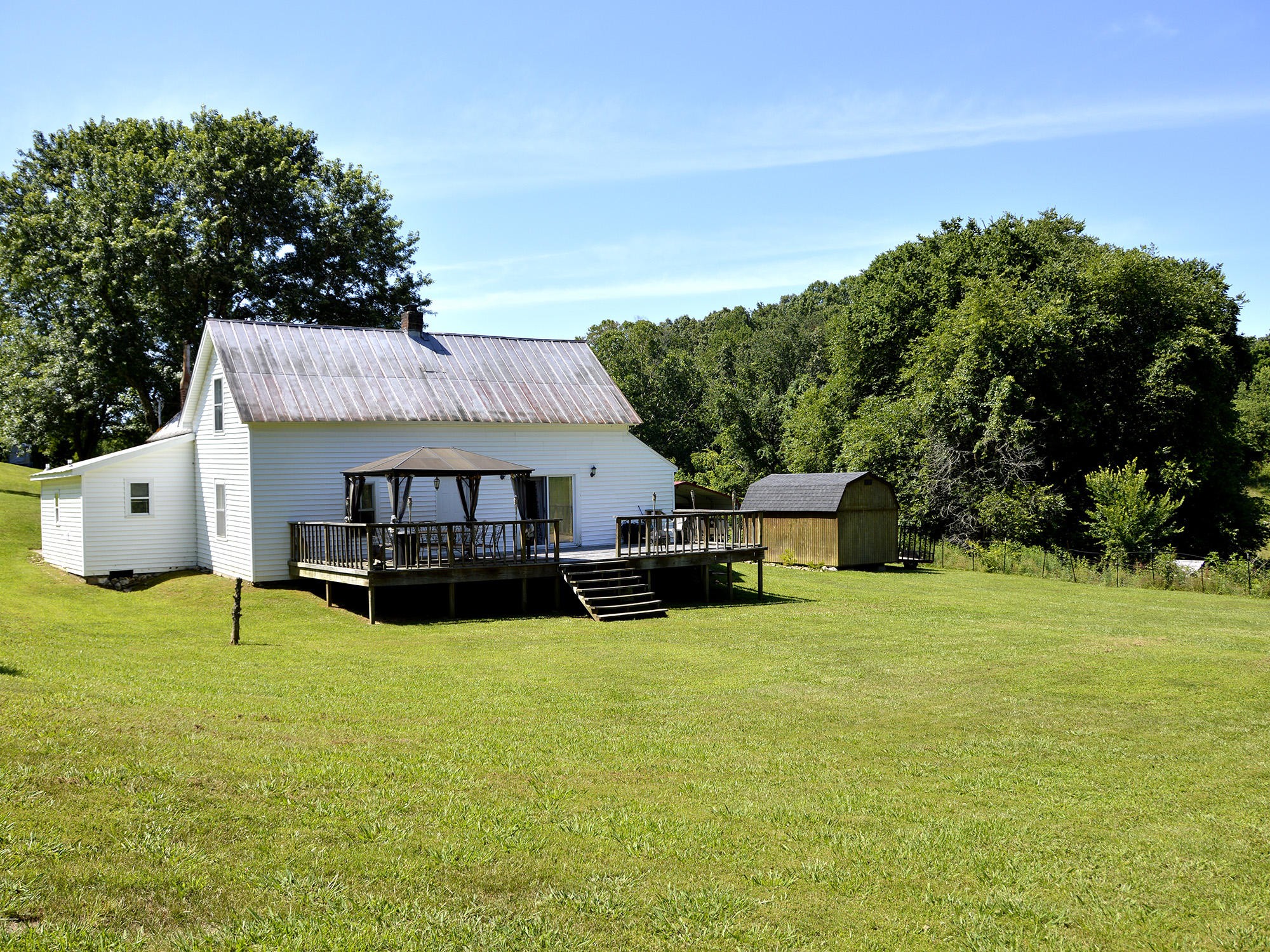 244 Sallings Road Luttrell, TN 37779 - Photo 17 of 19 a view of a house with a yard