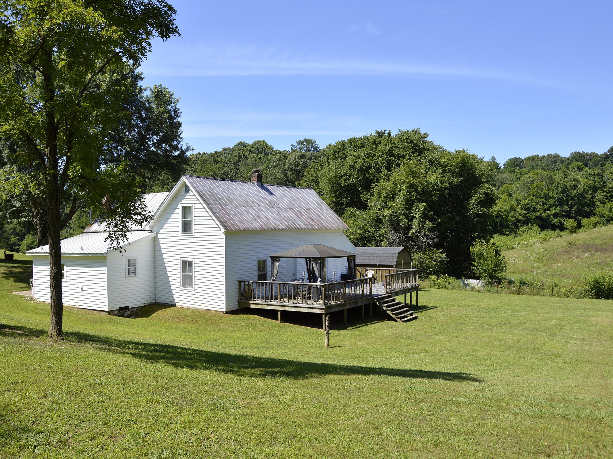 244 Sallings Road Luttrell, TN 37779 - Photo 18 of 19 a view of house that has a yard