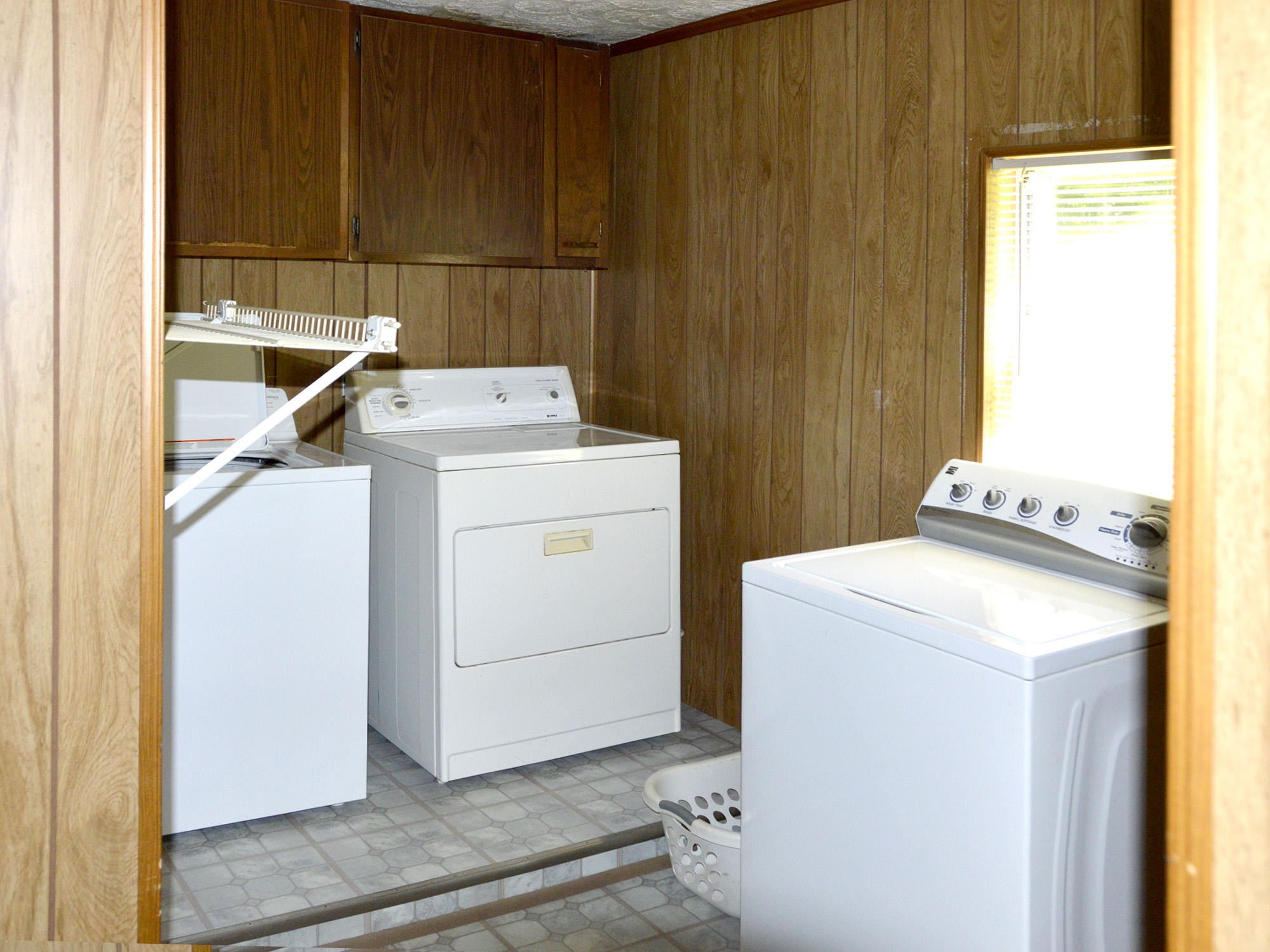 244 Sallings Road Luttrell, TN 37779 - Photo 7 of 19 a utility room with dryer and washer