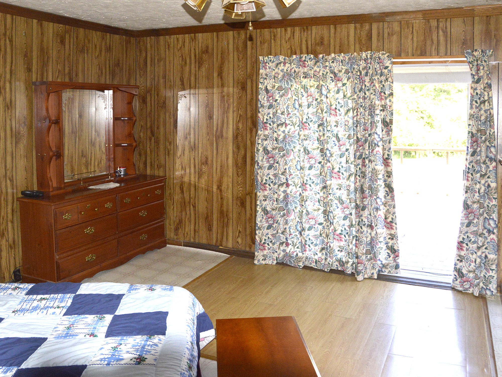 244 Sallings Road Luttrell, TN 37779 - Photo 9 of 19 a view of a closet area with rug and wooden floor