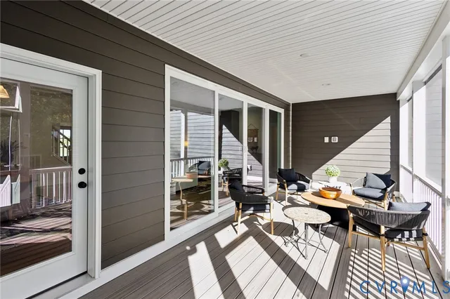 a bedroom with a bed and a chair