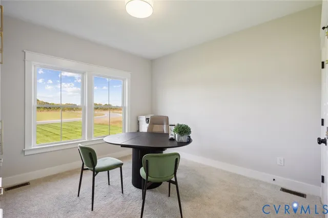 a kitchen with granite countertop a sink cabinets and stainless steel appliances