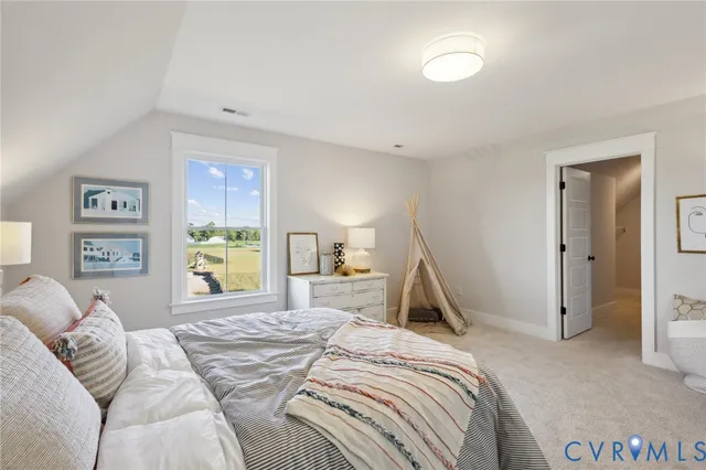 a bed room with a bed and a couch