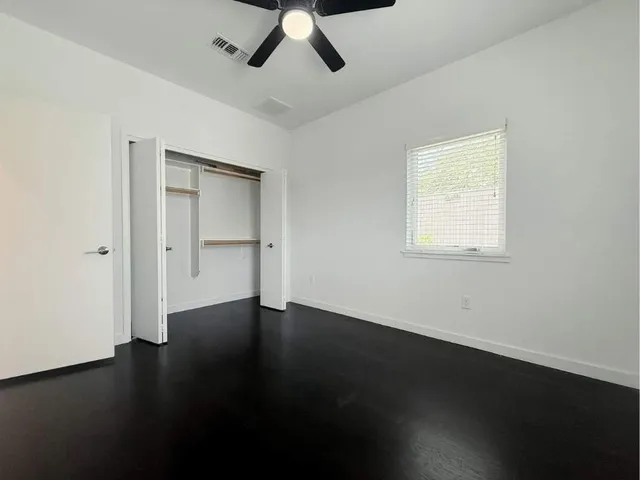 a view of bathroom with a sink toilet and a mirror