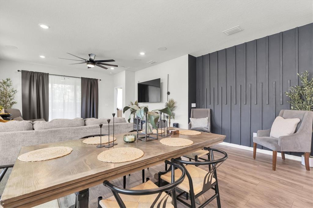 6352 Mooring Line Circle Apollo Beach, FL 33572 - Photo 11 of 33 a view of a a dining room with furniture window and wooden floor