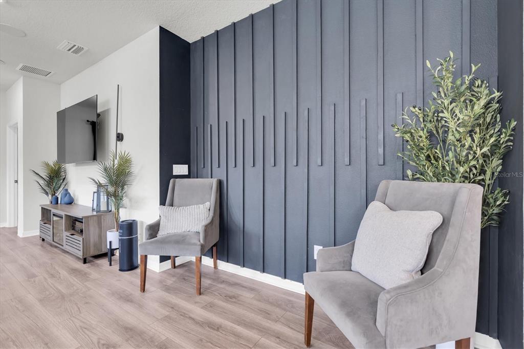 6352 Mooring Line Circle Apollo Beach, FL 33572 - Photo 12 of 33 a living room with furniture and a potted plant