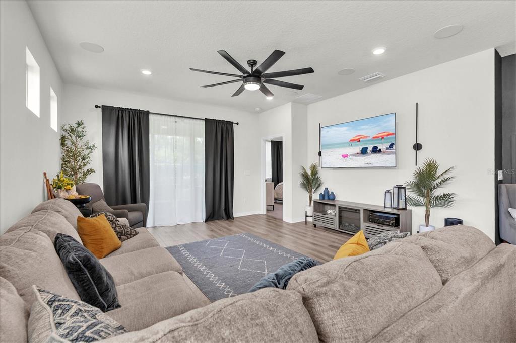 6352 Mooring Line Circle Apollo Beach, FL 33572 - Photo 17 of 33 a living room with furniture and a flat screen tv