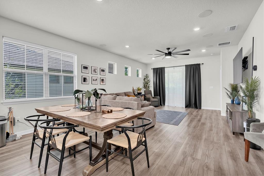 6352 Mooring Line Circle Apollo Beach, FL 33572 - Photo 19 of 33 a view of a dining room with furniture and a large window