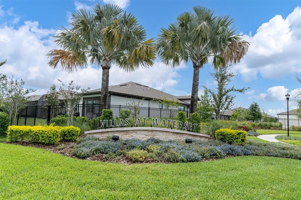 6352 Mooring Line Circle Apollo Beach, FL 33572 - Photo 2 of 33 a house with palm tree in front of it