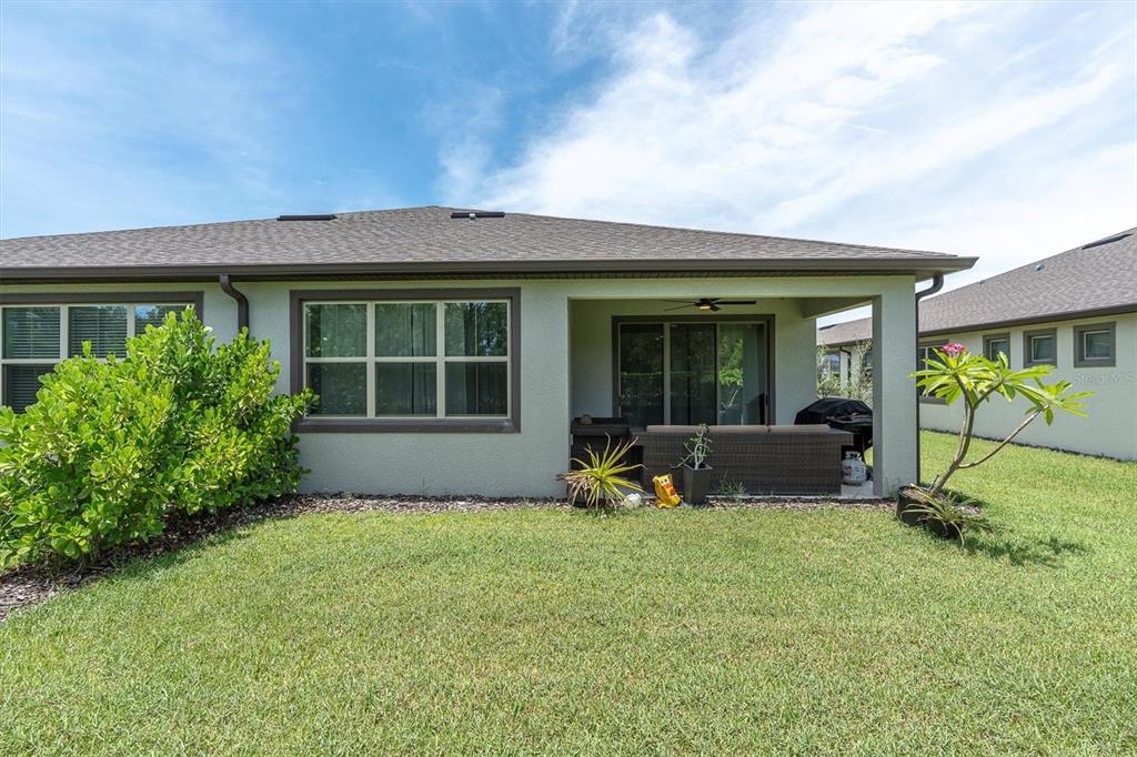 6352 Mooring Line Circle Apollo Beach, FL 33572 - Photo 28 of 33 a view of a house with backyard sitting area and porch