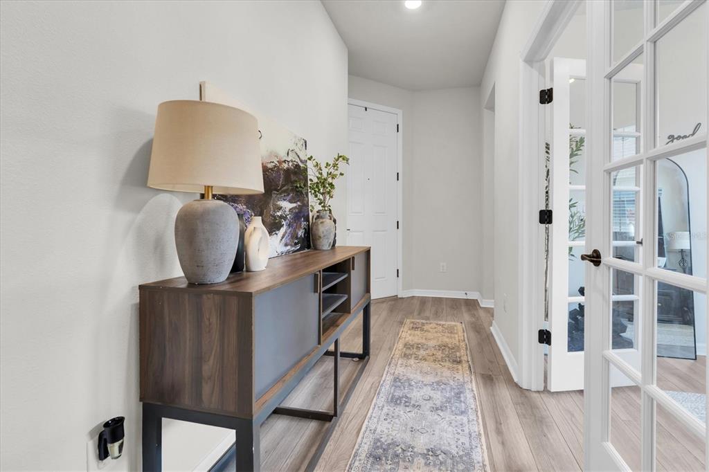 6352 Mooring Line Circle Apollo Beach, FL 33572 - Photo 5 of 33 a living room with furniture and a mirror