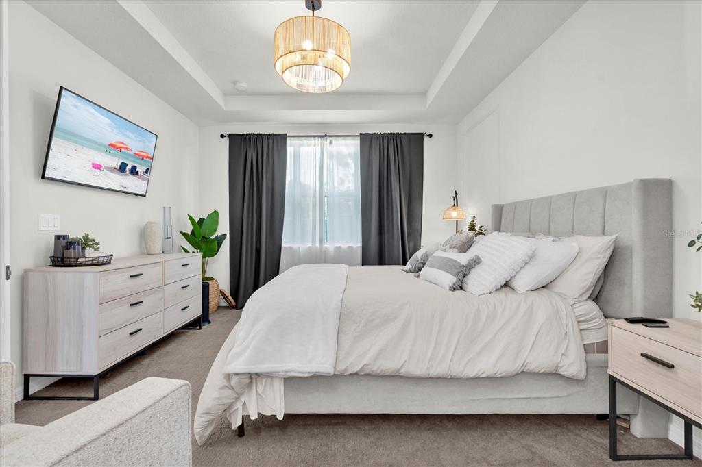 6352 Mooring Line Circle Apollo Beach, FL 33572 - Photo 9 of 33 a bedroom with a bed and a window