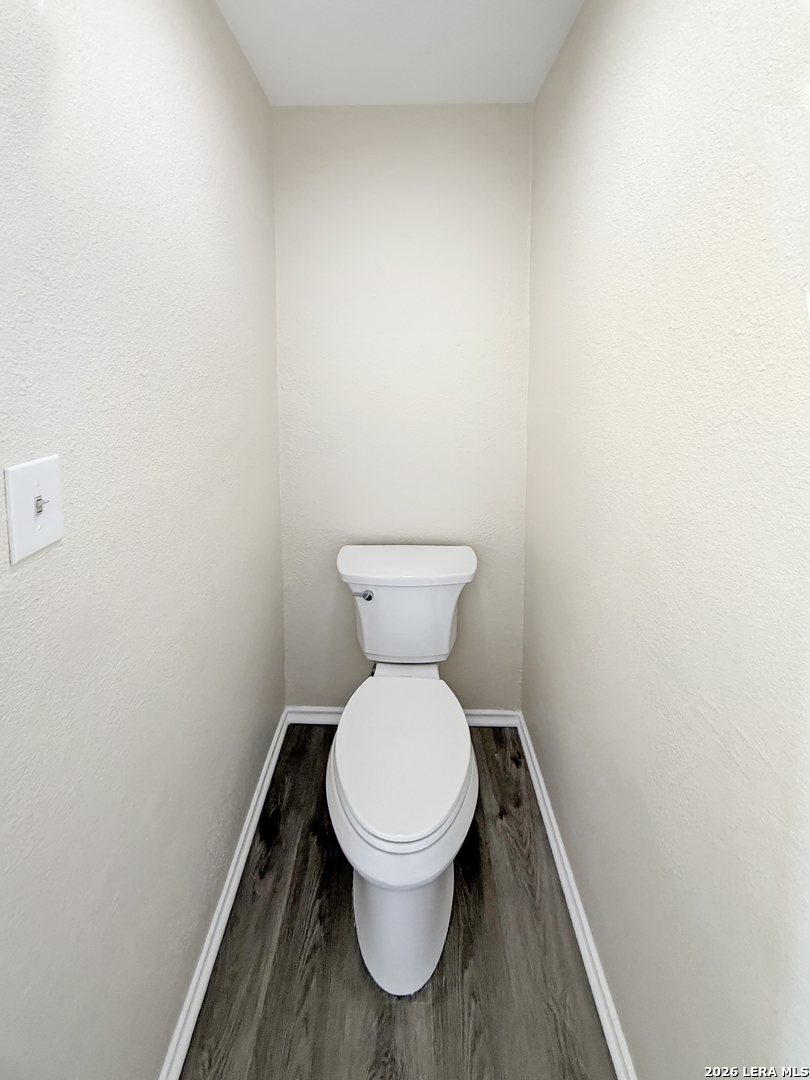 9808 Delta Ridge Drive Converse, TX 78109 - Photo 22 of 38 a white toilet sitting in a bathroom
