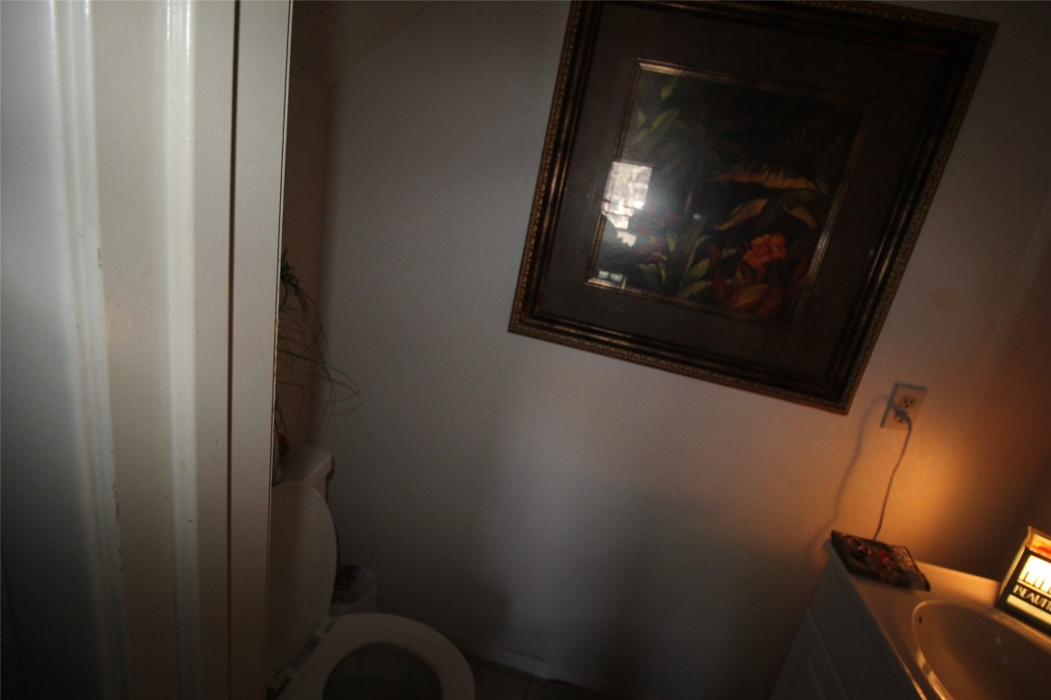 808 Angleton Cove Austin, TX 78748 - Photo 17 of 17 Bathroom featuring toilet and vanity