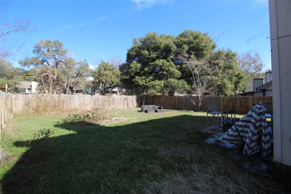 808 Angleton Cove Austin, TX 78748 - Photo 3 of 17 Fenced backyard with a patio