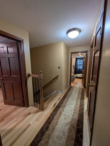 a bathroom with a sink toilet and mirror