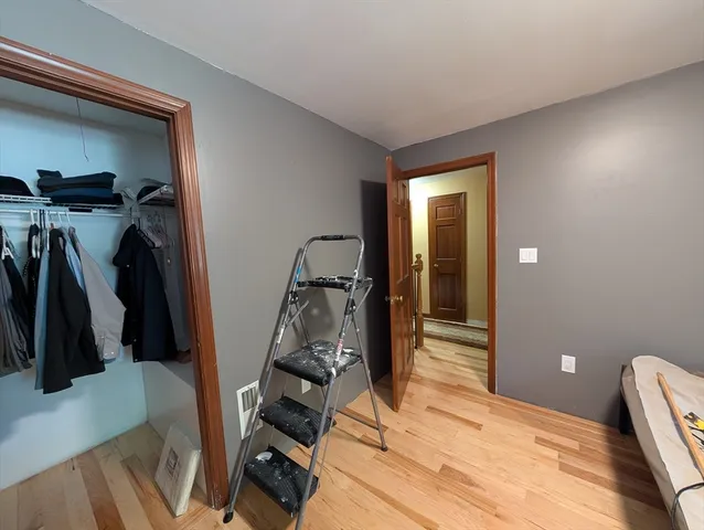 a backyard of a house with yard barbeque oven and outdoor seating