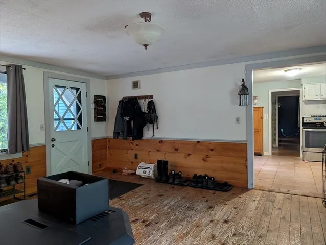 a bed room with furniture and a window