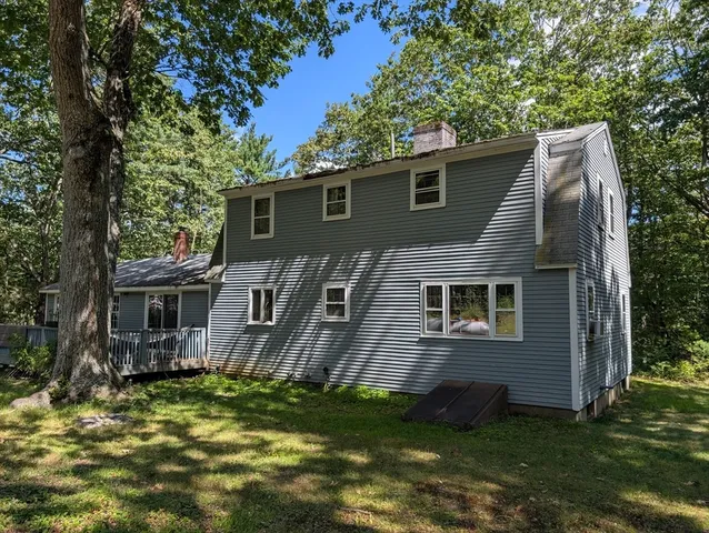 a view of outdoor space with trees all around