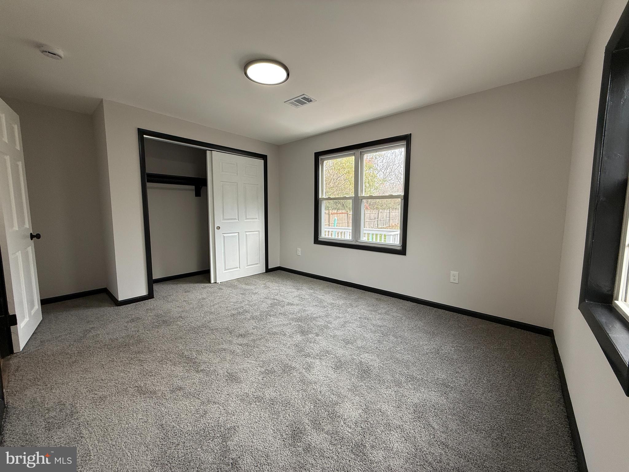 11 Sunset Lane Bridgeton, NJ 08302 - Photo 11 of 16 an empty room with windows and closet