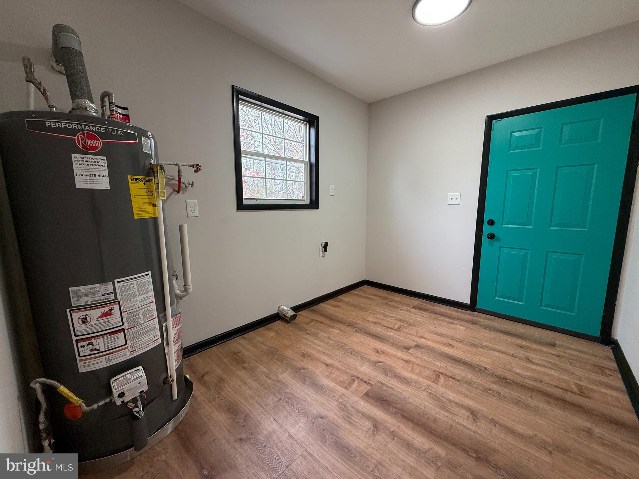 11 Sunset Lane Bridgeton, NJ 08302 - Photo 14 of 16 a view of an empty room with wooden floor and closet