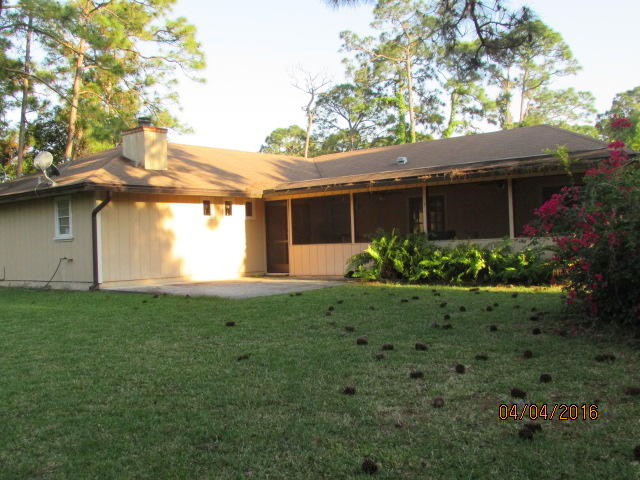 8720 Hidden Pines Road Fort Pierce, FL 34945 - Photo 23 of 31 23 rear