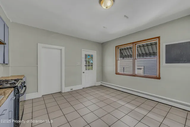 a view of an empty room with window