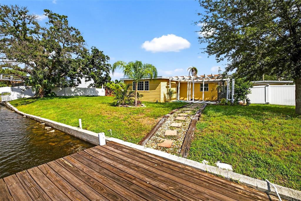 3225 West Shell Point Road Ruskin, FL 33570 - Photo 11 of 67 a view of a swimming pool with an outdoor space