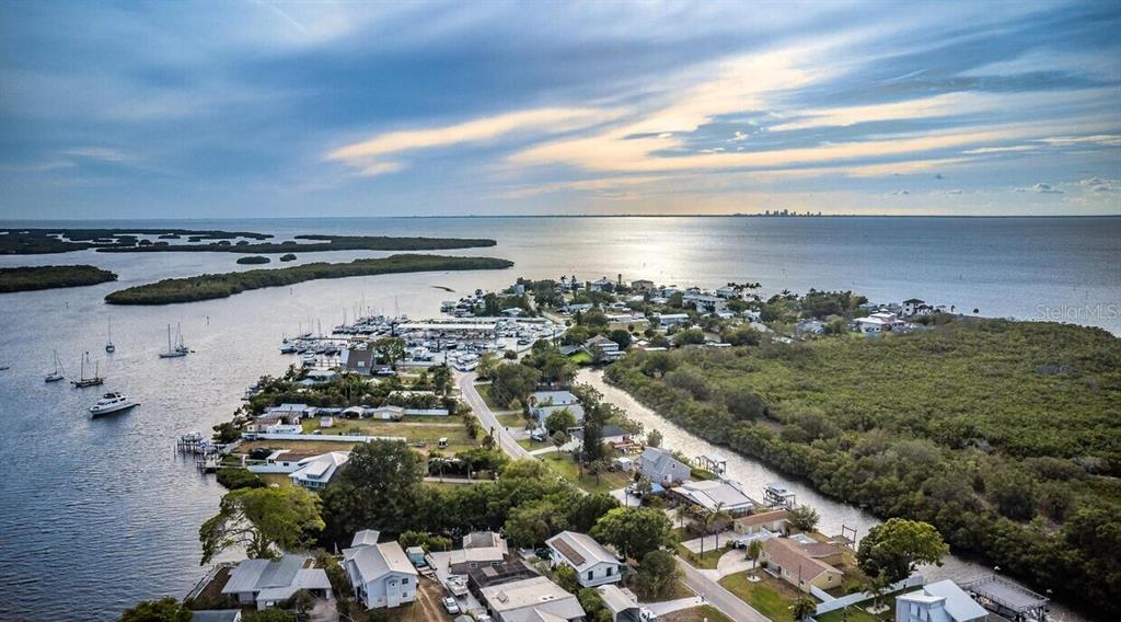 3225 West Shell Point Road Ruskin, FL 33570 - Photo 3 of 67 a view of a lake with a city