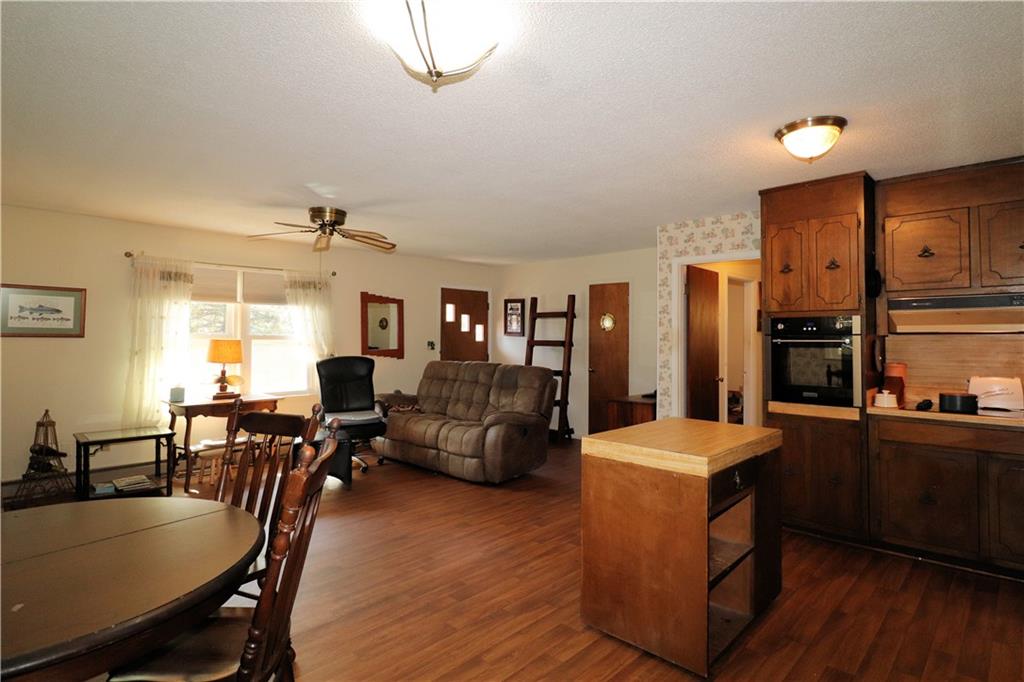 70 North Bellview Road Aragon, GA 30104 - Photo 5 of 30 a large kitchen with a table chairs refrigerator and cabinets