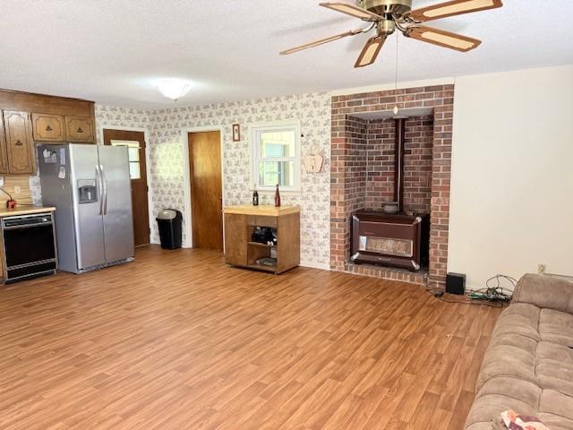 70 North Bellview Road Aragon, GA 30104 - Photo 8 of 30 a view of a livingroom with a fireplace a ceiling fan and wooden floor
