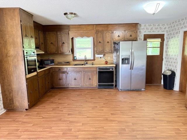 70 North Bellview Road Aragon, GA 30104 - Photo 9 of 30 a large kitchen with cabinets and stainless steel appliances
